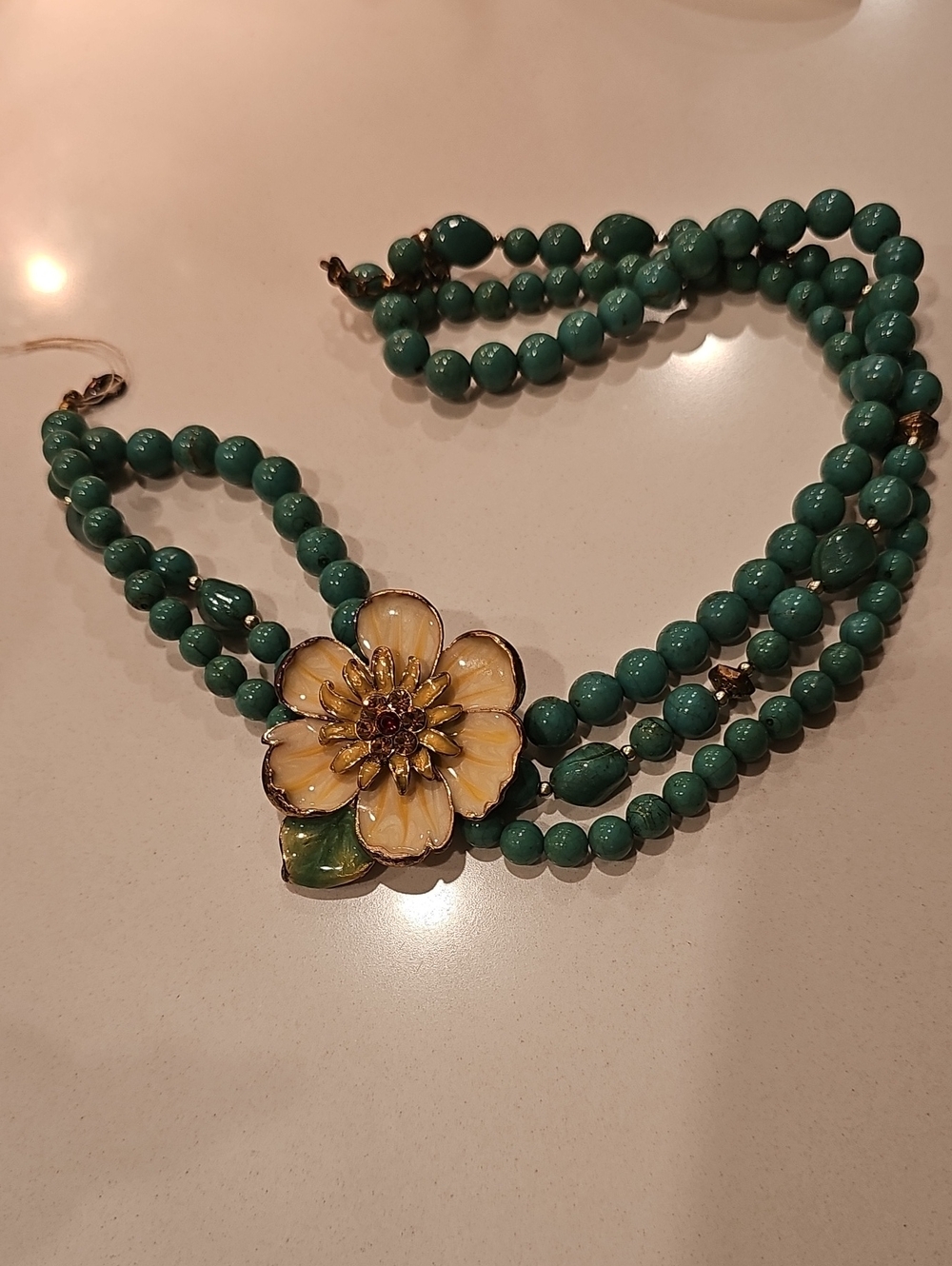 Vintage-Inspired Green Beaded Necklace with Yellow Enamel Flower